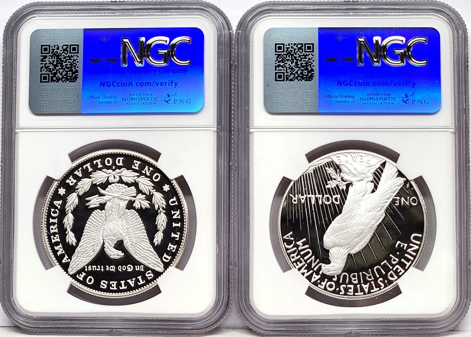Reverse side of proof Morgan and Peace silver dollar two coin set in NGC slabs