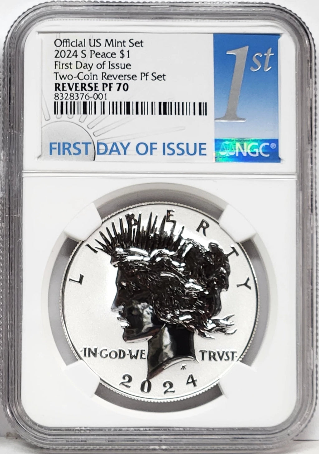 Obverse side of 2024 S reverse proof Peace silver dollar in NGC slab with first day of issue label