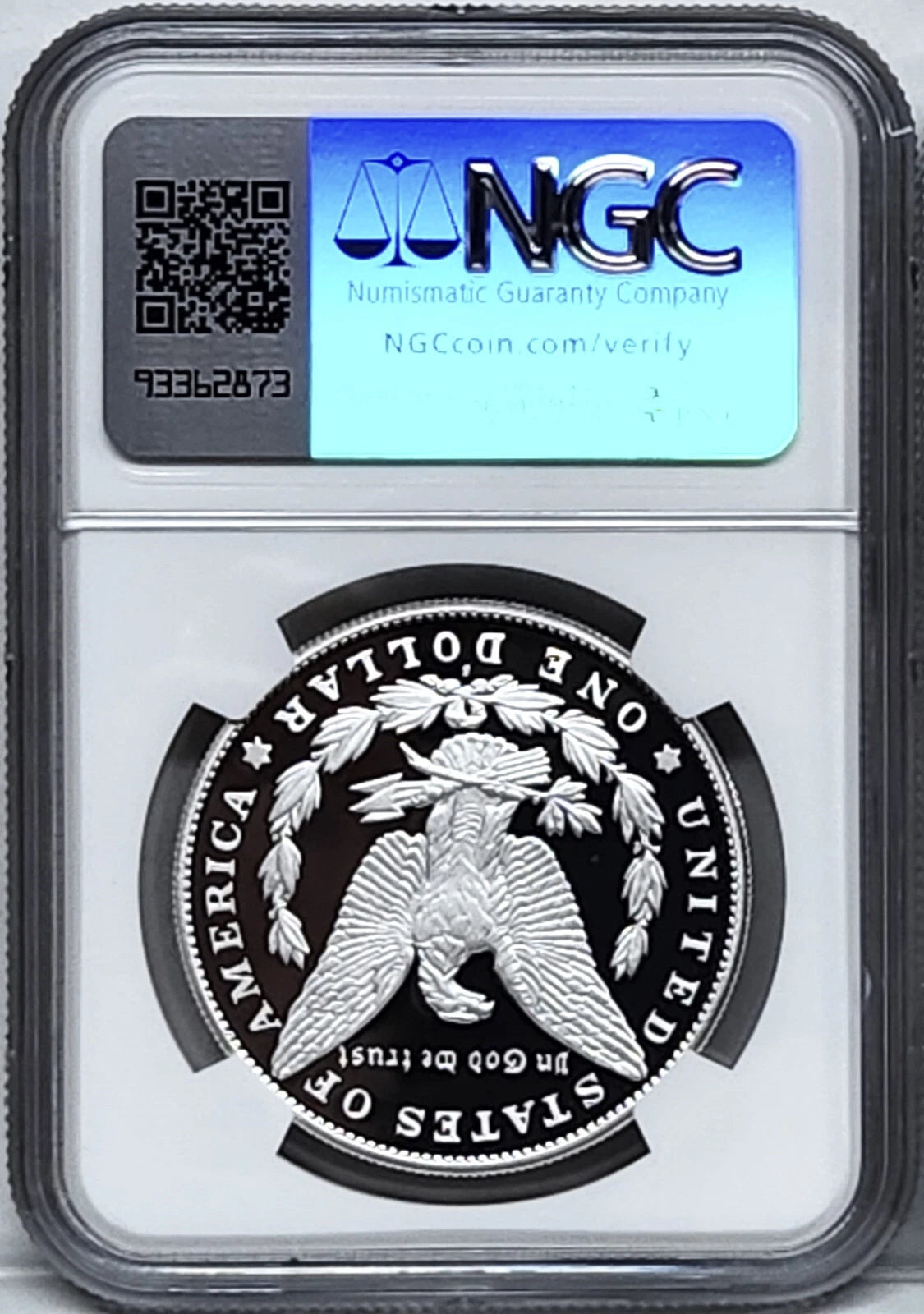 Reverse side of proof Morgan silver dollar in NGC slab