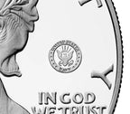 Close up of the American eagle silver dollar featuring the US Navy 250th anniversary privy mark consisting of a circular emblem that reads 'UNITED STATES NAVY' surrounding the Navy insignia.