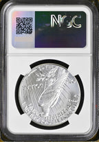 Reverse side of uncirculated Peace silver dollar in NGC slab