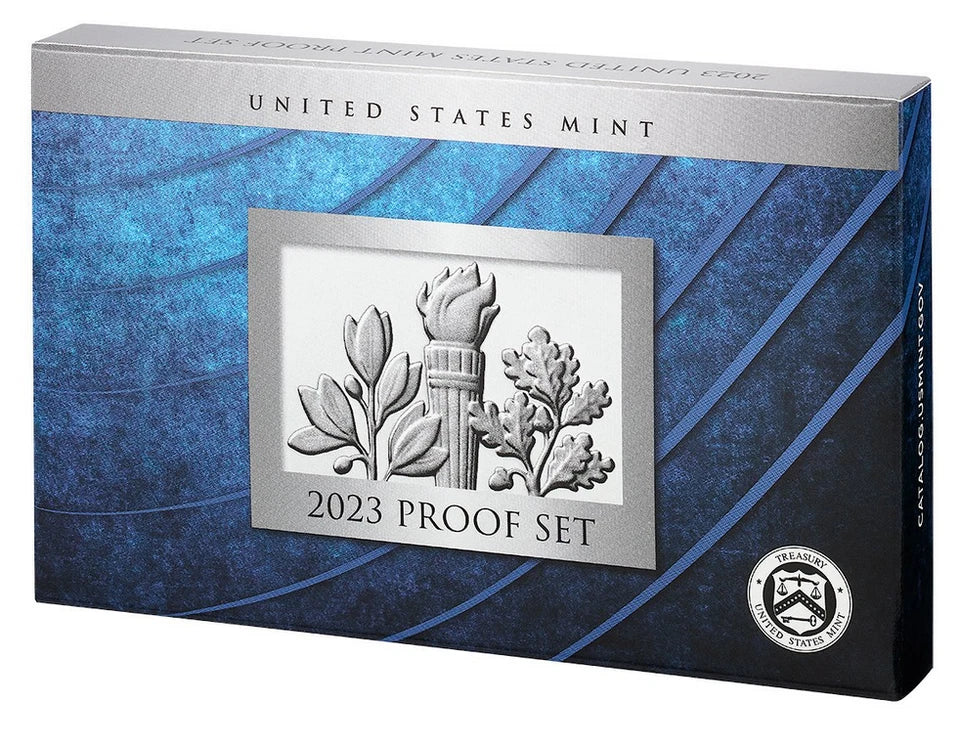 Outer box of the 2023 United States Mint Proof Set featuring a textured blue background and a central silver panel displaying a torch flanked by leafy branches. Text reads 'UNITED STATES MINT' and '2023 PROOF SET,' with the U.S. Treasury seal in the bottom right.
