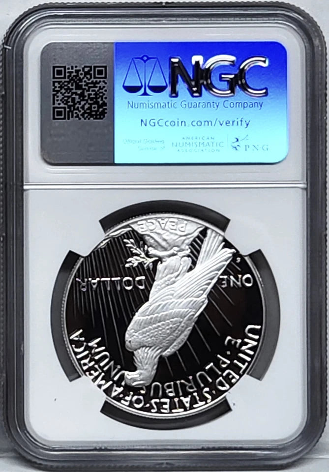 Reverse side of proof Peace silver dollar in NGC slab